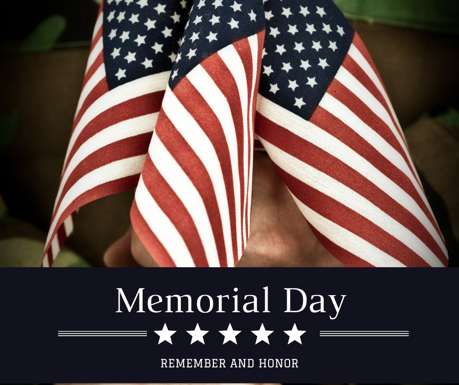 Memorial Day hands on flags